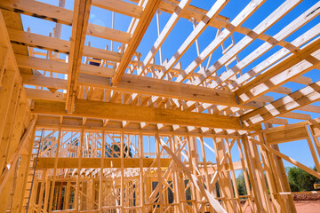 New house construction with wooden beams the ceiling and wall system built frame