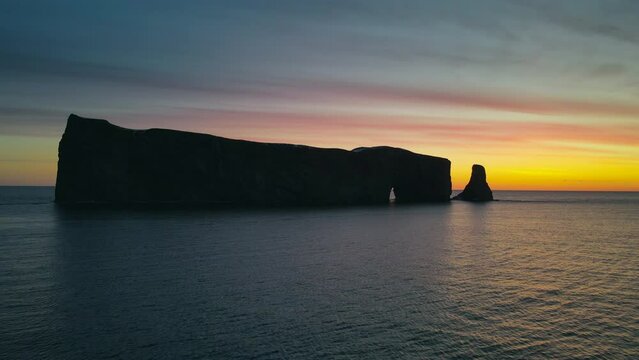 Drone view at sunrise of famous perce rock in Perc&eacute;, Qu&eacute;bec, Canada