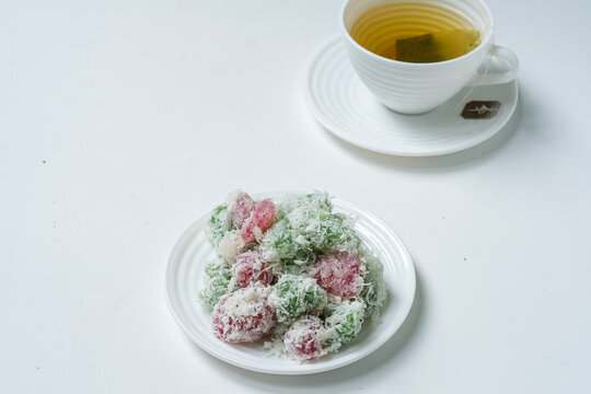 cenil or gurandil is one indonesian traditional cake made from starch, served with grated coconut and sugar