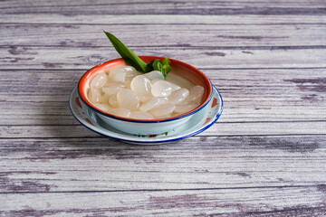 manisan kolang kaling or preserved sugar palm fruit, Indonesian drink and dessert during month of...