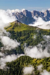 Dolomites mountains in the middle of Clouds