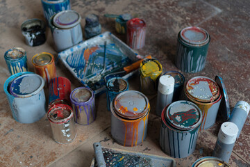 Cans of colored paint. Interior Painting, Art studio