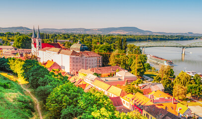 Historic town from the Esztergom basilica in Hungary. The Danube river and the border bridge to the...