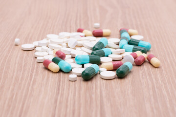 Fototapeta na wymiar colorful pills with capsules and pills put on the hospital pharmacy dispensing table Pharmacies and clinics' health care