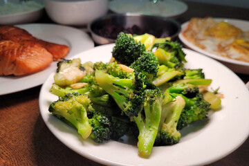 Sauteed broccoli with garlic, home cooked food.