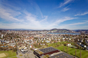 Aerial view of City of Luzern with scenic landscape on a blue cloudy spring day. Photo taken March 22nd, 2023, Lucerne, Switzerland.
