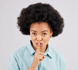 Secret, portrait and woman with finger on lips in studio, white background and privacy sign. Face of female model, silence and shush for quiet, gossip and whisper emoji for confidential mystery news