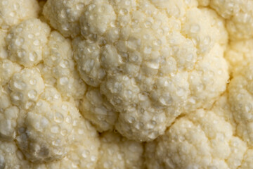 Cauliflower close up during cooking, fresh raw cauliflower