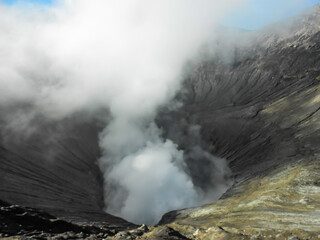 Close up of volcano crater spewing smoke at Mount Bromo