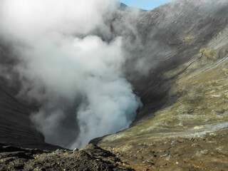 Volcano crater spewing smoke activity at Mount Bromo Tengger Semeru National park