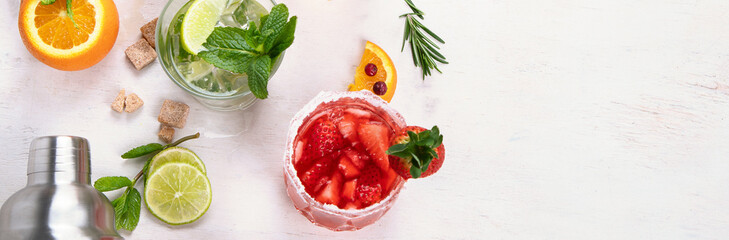 Set of various cocktails with fruits on white background.