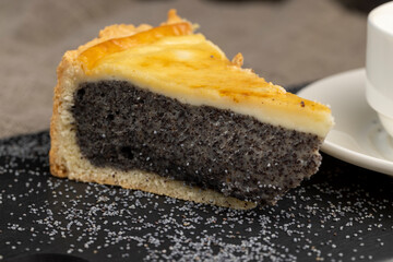 Delicious poppy seed cake with a thin sponge cake and lots of poppy seed filling