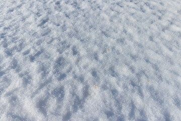 a large amount of snow in snowdrifts in winter