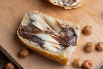 slices of bread with chocolate butter on the table
