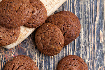 chocolate cookies on a wooden board