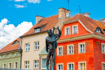 Fototapeta na wymiar fountain fragment with statue of Apollo in old town square. Poznan. Poland