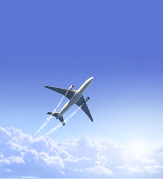 Vertical nature background with aircraft and Jet trailing smoke in the sky. Airplane and condensation trail. Foggy trail jet and plane in blue sky with white clouds