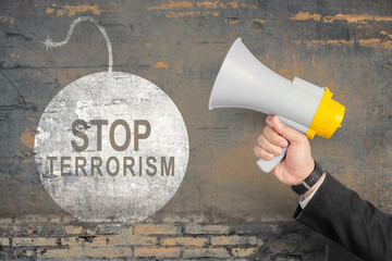 Businessman showing stop terrorism sign