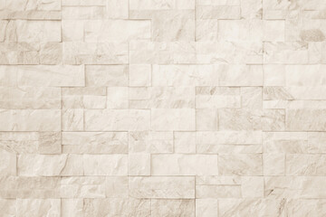 Cream and white brick wall texture background. Brickwork and stonework flooring interior rock old...