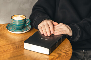 Fototapeta na wymiar Man reading Bible early in the morning, Bible study, christianity.