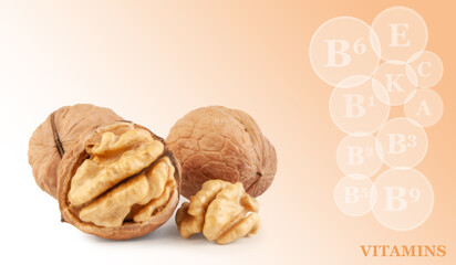 fresh kernels, broken and whole walnuts close-up isolated on color gradient background with markings of vitamins found in walnut