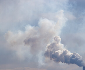 Fototapeta na wymiar industrial smoke in the sky as background