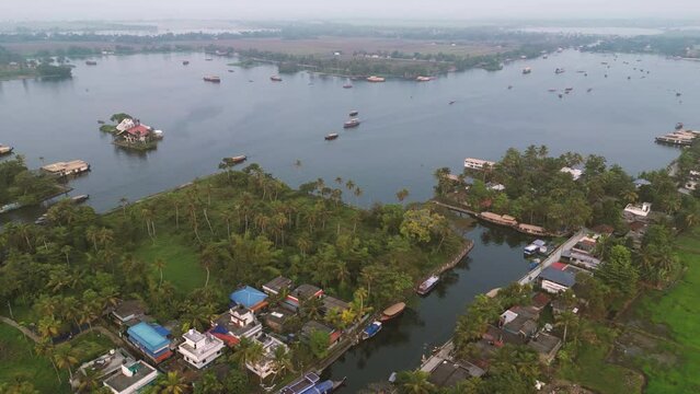 Aerial shot, Bird's eye view of house boats over the backwaters in Alleppey, Alappuzha ,Kerela. South India