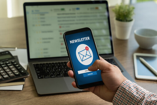 man signup page subscribe newsletter concept on tablet and smartphone screen on mobile - Powered by Adobe