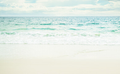Beach Sand with Sea Shore Water Summer and Blue Sky Background,Cloud White with Wave Ocean Island at Coast,Beautiful Seascape Nature Space,for Tourism Vacation Travel Summer Holidays.
