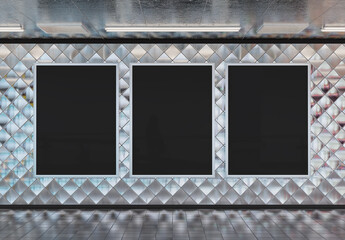 Three vertical billboards on underground subway wall Mockup. Hoardings advertising triptych on train station 3D rendering