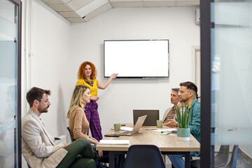 Business team on a morning briefing; business meeting and presentation in a modern office