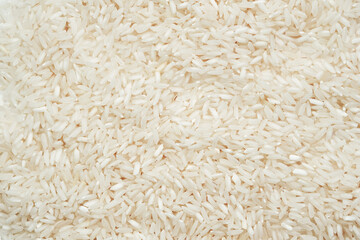 Polished long-grain rice, texture in close-up.