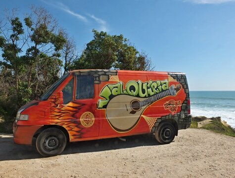 Colorful campervan painted with a mandolin on the Atlantic coast