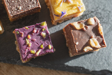 chocolate cake on a plate, Mixed Grand Candy Cake