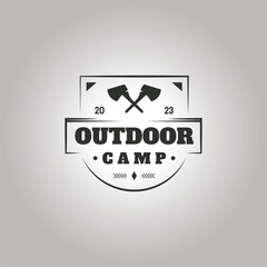 outdoor camp with crossed axe logo vector design