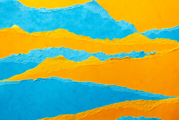 Ripped paper sheets. Background in blue and yellow colors