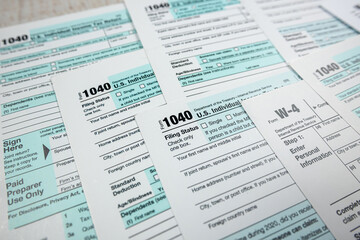Blank 1040  individual income tax return on desk