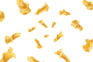 Falling raw Campanelle, uncooked Italian Pasta, isolated on white background, selective focus
