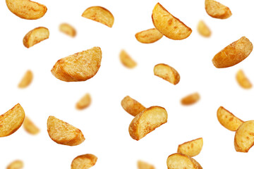 Falling fried Potato wedges, isolated on white background, selective focus