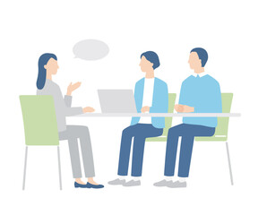 Obraz premium 相談をするシニア夫婦と女性スタッフ