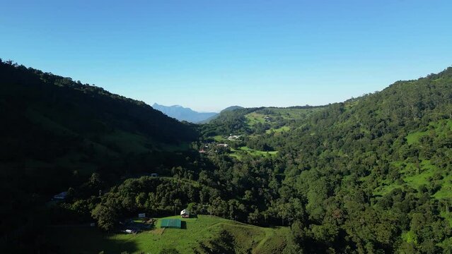Aerial views towards Mt Warning over the upper Numinbah Valley near the Gold Coast, New South Wales border in the Gold Coast Hinterland