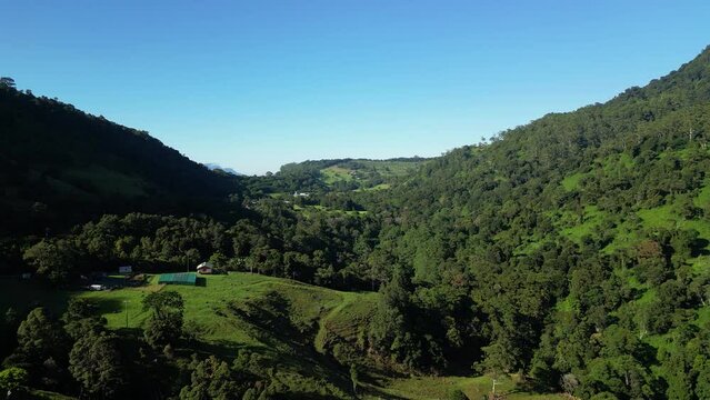 Aerial views towards Mt Warning over the upper Numinbah Valley near the Gold Coast, New South Wales border in the Gold Coast Hinterland