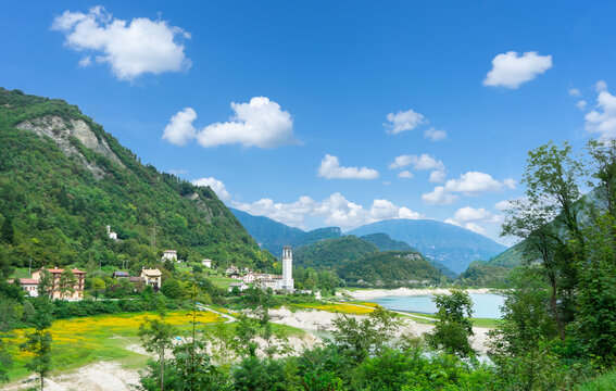 Beautiful summer view of the Arsie and Lake Corlo in Italy surrounded by the Alps.