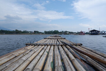 Bagendit Lake tourist attractions with a bamboo boat to play in the middle of the lake