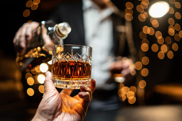 Celebrate whiskey on a friendly party in  restaurant