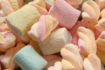 Colorful marshmallow spinning, rotation. Sweet food background. Close up. Video backdrop. Heap of...