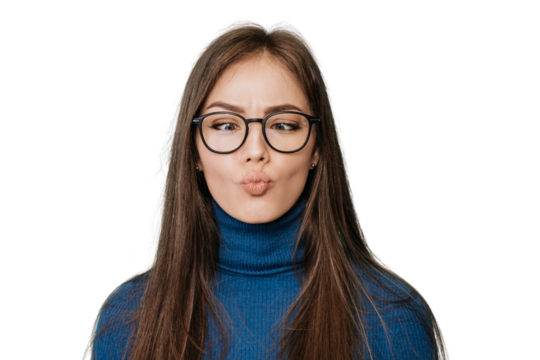 Young blonde Italian woman gesture making fish face with mouth and squinting eyes, crazy face, comical mood against transparent background. Pretty caucasian girl in blue sweater and glasses at studio.
