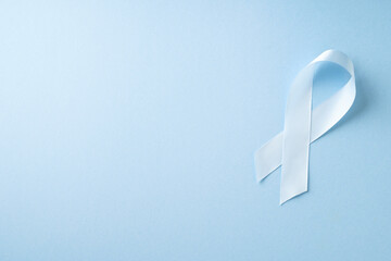 World diabetes day, cancer concept with ribbon on blue background