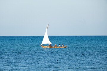 Wooden catamaran, old catamaran, sailboat in the sea with tourists 