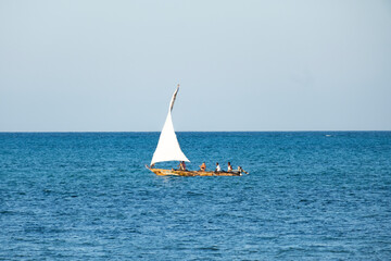 Wooden catamaran, old catamaran, sailboat in the sea with tourists 